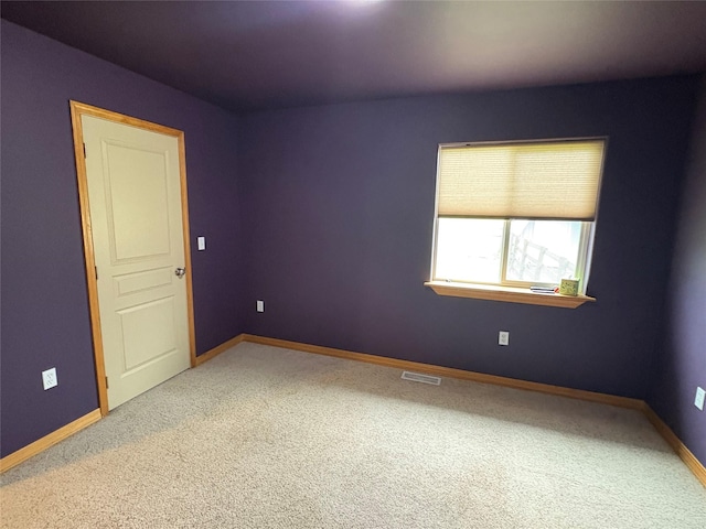 72822 Joes Ln, Arlee, MT 59821 - spare room with carpet and baseboards