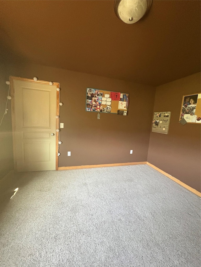 72822 Joes Ln, Arlee, MT 59821 - unfurnished room featuring carpet floors and baseboards