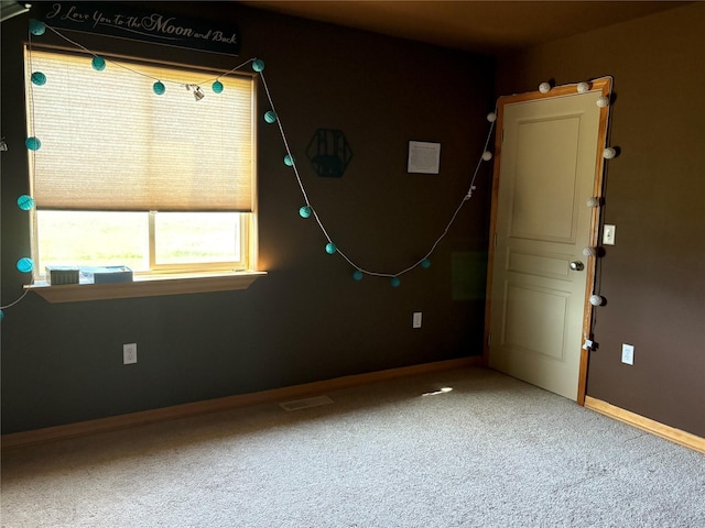 72822 Joes Ln, Arlee, MT 59821 - empty room with carpet and baseboards
