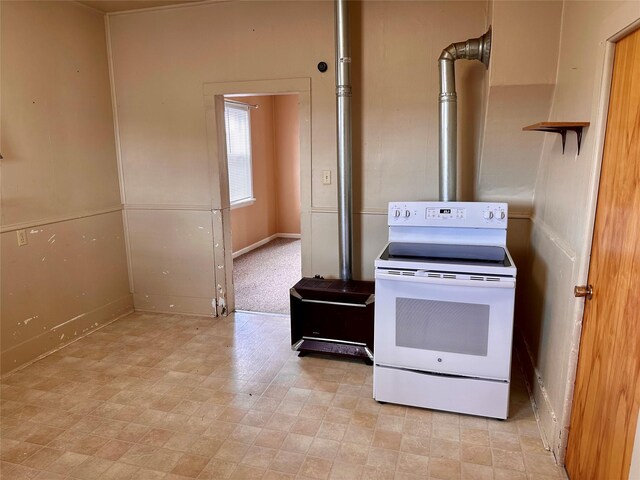 76 Missoula Ave, Butte, MT 59701 - kitchen with electric range and light flooring