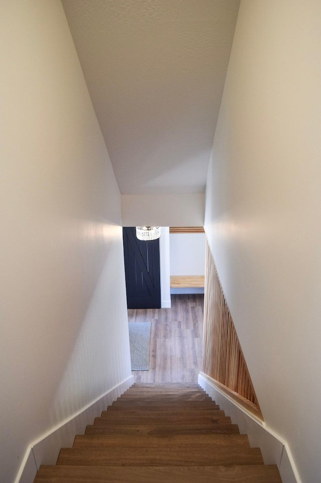 2736 Paniolo Pl, Missoula, MT 59808 - stairway with wood finished floors and lofted ceiling