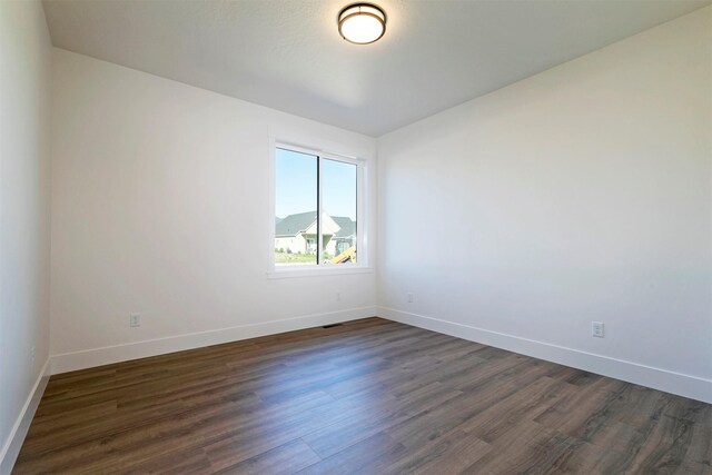 2736 Paniolo Pl, Missoula, MT 59808 - empty room featuring dark wood-style floors and baseboards