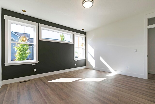 2736 Paniolo Pl, Missoula, MT 59808 - spare room with wood finished floors and baseboards