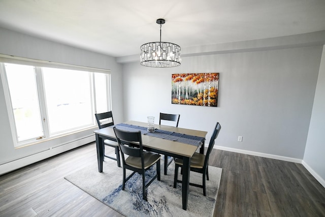 1536 Meadowlark Dr Unit 10B, Great Falls, MT 59404 - dining area featuring a chandelier, dark wood finished floors, and a baseboard radiator