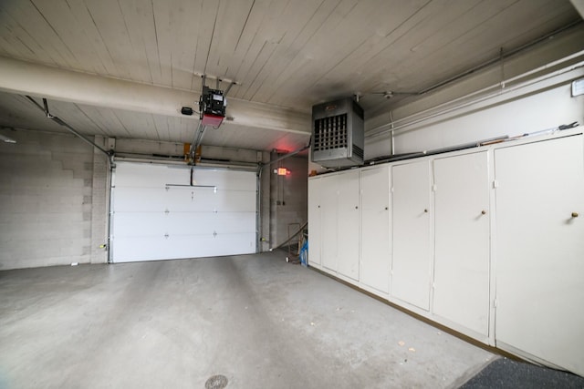 1536 Meadowlark Dr Unit 10B, Great Falls, MT 59404 - garage with a garage door opener and a heating unit