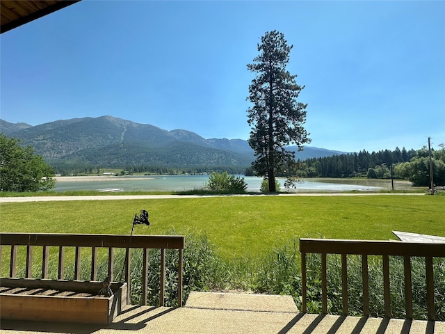 view of mountain backdrop with a large body of water