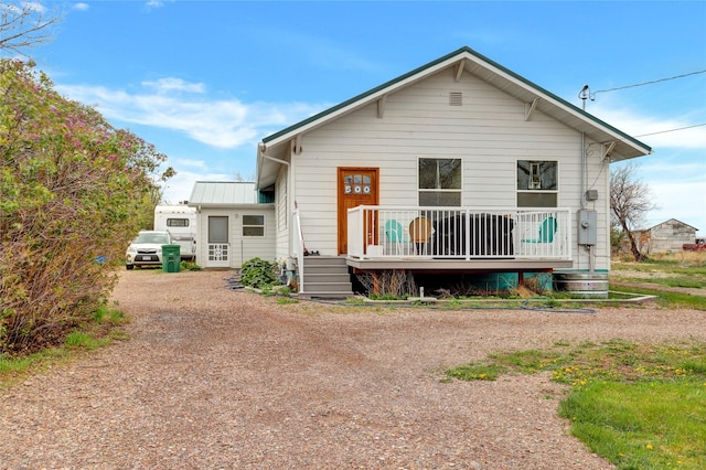 500 34th St NW, Great Falls, MT 59404 - view of front of house featuring a deck and driveway