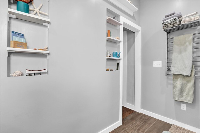 500 34th St NW, Great Falls, MT 59404 - laundry area featuring wood finished floors and baseboards