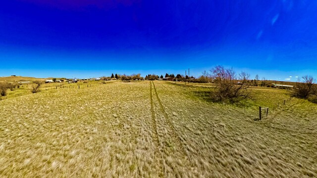 500 34th St NW, Great Falls, MT 59404 - view of yard featuring a view of countryside