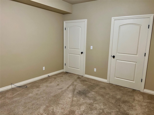 2905 Oshaughnesy St Unit 104, Missoula, MT 59808 - unfurnished bedroom with carpet and baseboards