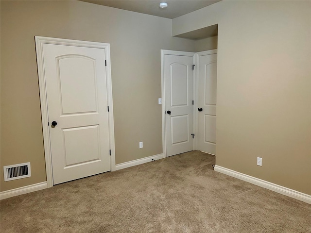 2905 Oshaughnesy St Unit 104, Missoula, MT 59808 - unfurnished bedroom featuring carpet floors and baseboards