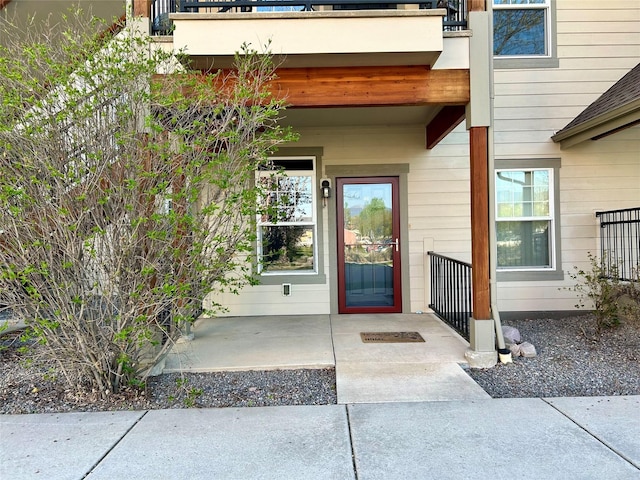 2905 Oshaughnesy St Unit 104, Missoula, MT 59808 - view of exterior entry featuring a balcony