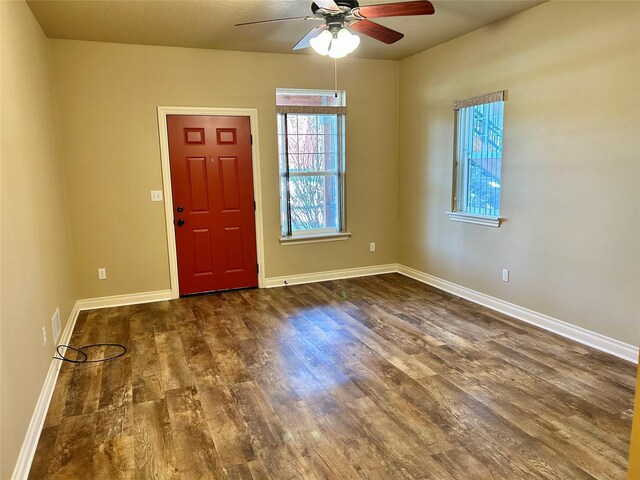 2905 Oshaughnesy St Unit 104, Missoula, MT 59808 - foyer entrance featuring wood finished floors, a ceiling fan, and baseboards
