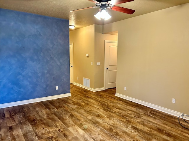 2905 Oshaughnesy St Unit 104, Missoula, MT 59808 - empty room with a ceiling fan, wood finished floors, and baseboards