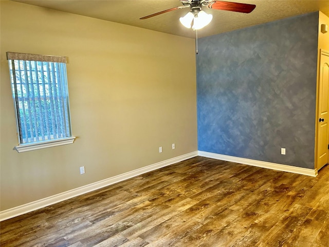 2905 Oshaughnesy St Unit 104, Missoula, MT 59808 - unfurnished room featuring wood finished floors and ceiling fan