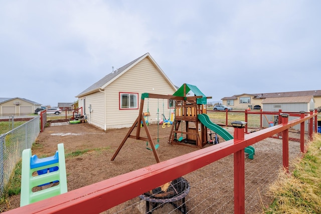 view of jungle gym featuring a fenced backyard