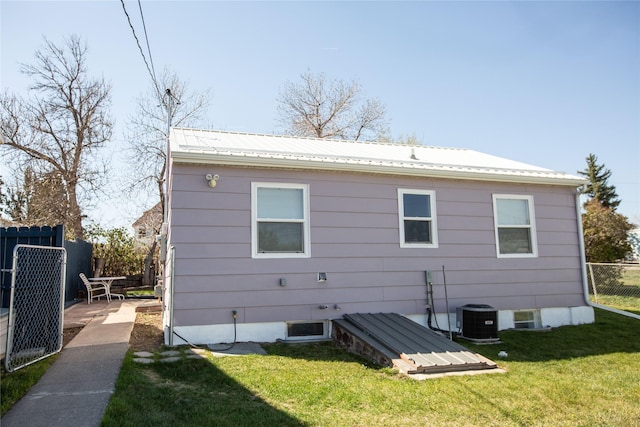 1011 4th Ave NW, Great Falls, MT 59404 - back of property with cooling unit and metal roof
