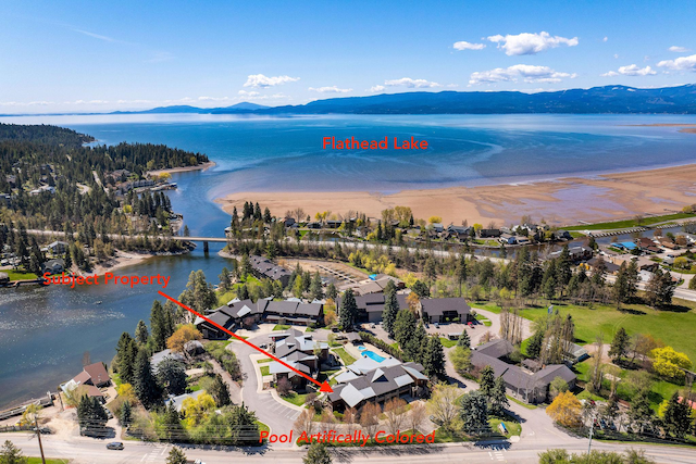 bird's eye view of a water and mountain view