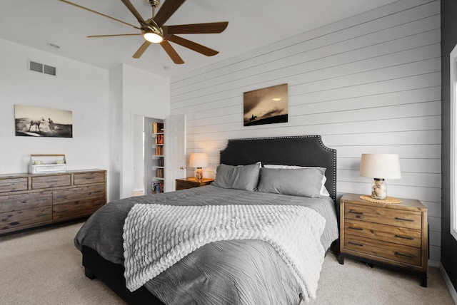 58 Morning View Way, Kalispell, MT 59901 - carpeted bedroom with wood walls and ceiling fan