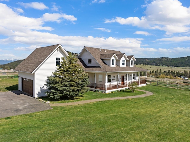 58 Morning View Way, Kalispell, MT 59901 - view of front of house with a porch, a garage, asphalt driveway, and a shingled roof
