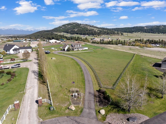 58 Morning View Way, Kalispell, MT 59901 - aerial view of sparsely populated area featuring a mountain backdrop and a pastoral area