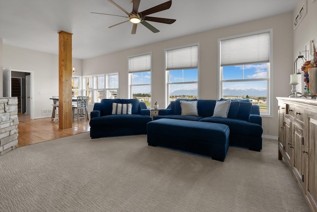 58 Morning View Way, Kalispell, MT 59901 - living room with ceiling fan, healthy amount of natural light, and baseboards