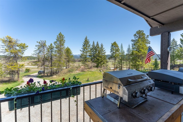 5550 Farm To Market Rd, Whitefish, MT 59937 - wooden terrace featuring area for grilling and a mountain view