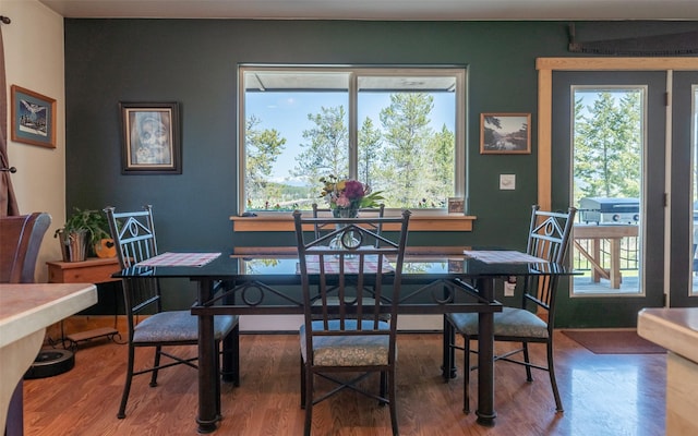 5550 Farm To Market Rd, Whitefish, MT 59937 - dining area featuring healthy amount of natural light, wood finished floors, and a desk