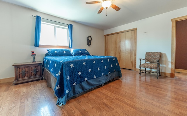 5550 Farm To Market Rd, Whitefish, MT 59937 - bedroom featuring wood finished floors, a closet, and ceiling fan