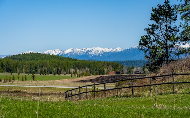 5550 Farm To Market Rd, Whitefish, MT 59937 - mountain view featuring rural landscape and a heavily wooded area