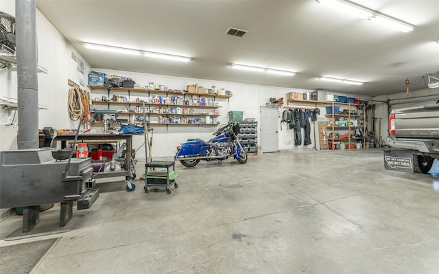 5550 Farm To Market Rd, Whitefish, MT 59937 - garage with a workshop area