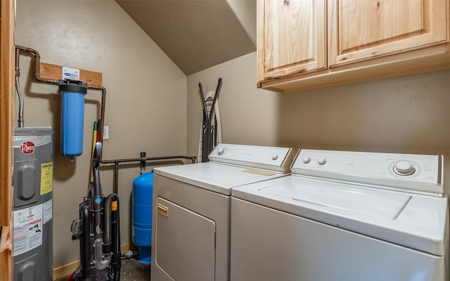 5550 Farm To Market Rd, Whitefish, MT 59937 - washroom with water heater, separate washer and dryer, and cabinet space