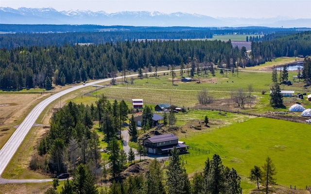 5550 Farm To Market Rd, Whitefish, MT 59937 - aerial view of sparsely populated area with a forest and mountains