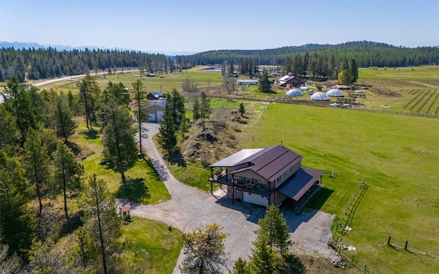 5550 Farm To Market Rd, Whitefish, MT 59937 - view of rural area with a heavily wooded area