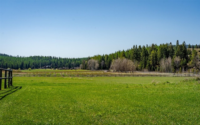5550 Farm To Market Rd, Whitefish, MT 59937 - view of yard featuring a view of rural / pastoral area and a view of trees
