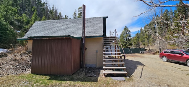11169 Stemple Pass Rd, Lincoln, MT 59639 - view of outbuilding featuring stairway