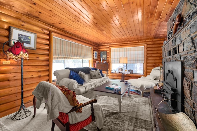 living area featuring wooden ceiling, rustic walls, and a stone fireplace