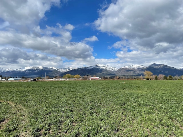 view of mountain backdrop featuring rural landscape