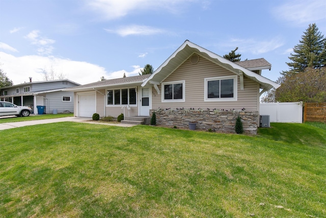 433 N 10th Ave, Bozeman, MT 59715 - view of front of home with an attached garage, concrete driveway, and roof with shingles