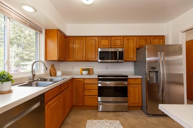 433 N 10th Ave, Bozeman, MT 59715 - kitchen featuring appliances with stainless steel finishes, a sink, and light countertops