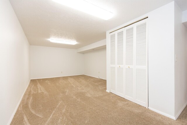 433 N 10th Ave, Bozeman, MT 59715 - finished below grade area with carpet flooring, a textured ceiling, and baseboards