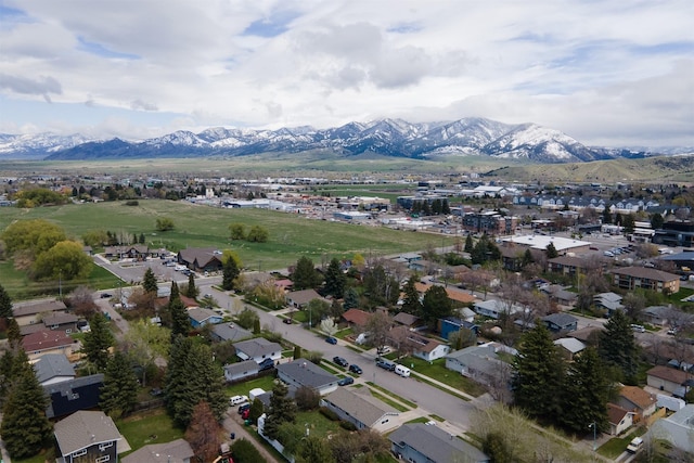 433 N 10th Ave, Bozeman, MT 59715 - aerial view of property and surrounding area featuring a mountain backdrop and nearby suburban area