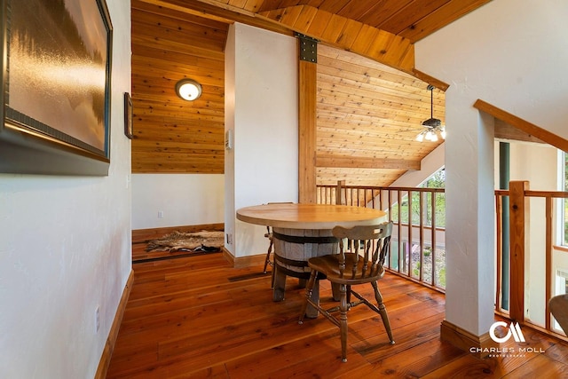 dining area with baseboards, hardwood / wood-style floors, ceiling fan, lofted ceiling, and wooden ceiling