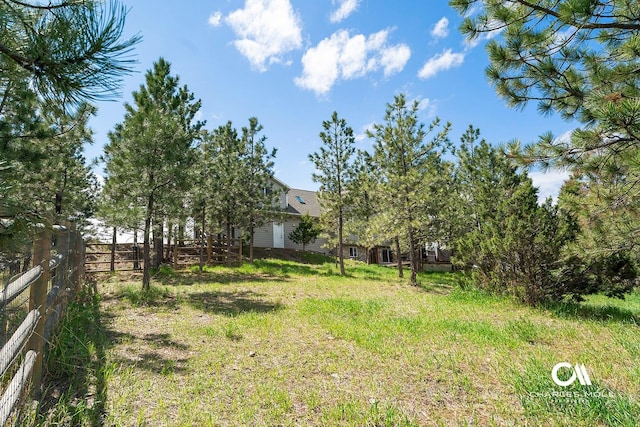 view of yard with fence