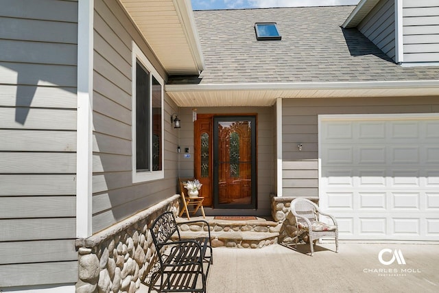 property entrance featuring roof with shingles