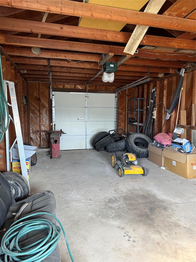 garage featuring a garage door opener