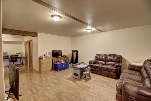45292 Locust Ln, Charlo, MT 59824 - living room with light wood-style floors and beam ceiling