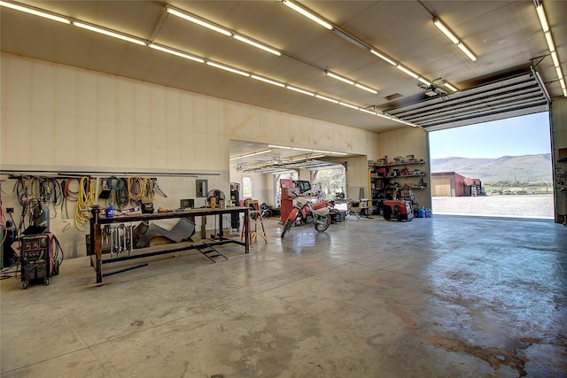 45292 Locust Ln, Charlo, MT 59824 - garage featuring a workshop area and a mountain view