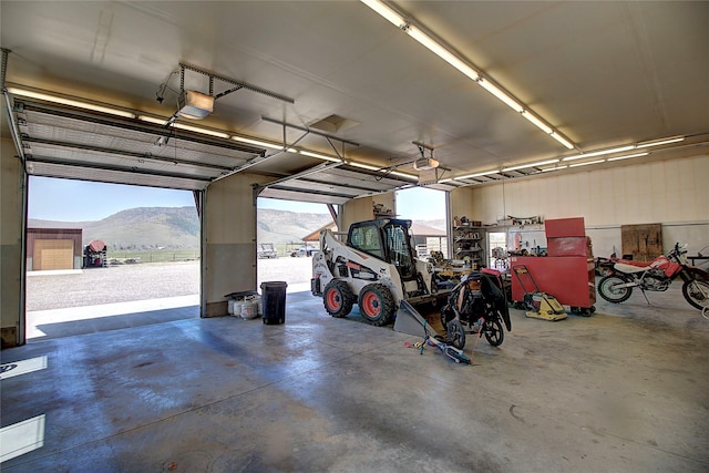 45292 Locust Ln, Charlo, MT 59824 - garage featuring a mountain view and a garage door opener