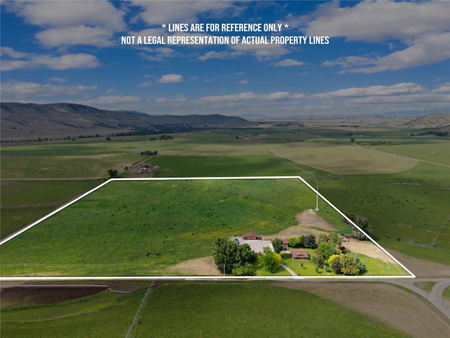 45292 Locust Ln, Charlo, MT 59824 - aerial view of sparsely populated area featuring property boundaries highlighted and a mountain backdrop